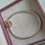 Pandora Moments Two-tone Logo 14k rose gold T-Bar snake chain bracelet  with circular logo toggle clasp size (18.5cm) Image 2