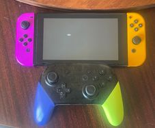 Nintendo Switch console with Splatoon 3 Pro Controller