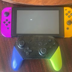 Nintendo Switch console with Splatoon 3 Pro Controller