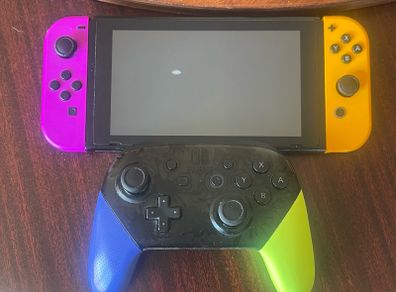 Nintendo Switch console with Splatoon 3 Pro Controller