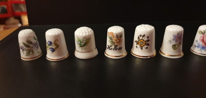 Collection of Flower Themed Gold Coloured Edged Thimbles