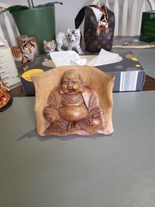 Buddha hand carved