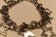 Heavy link chain bracelet with star charms