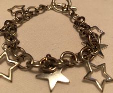 Heavy link chain bracelet with star charms