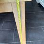 Solid wood dining table. Damage on corner as shown in photos. Image 8