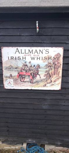 large  allmans  whiskey  metal  sign