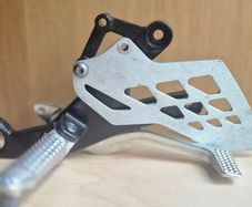 OEM BMW S1000RR (2009-2014) Front Footrest / Rearset Assembly."