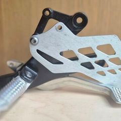 OEM BMW S1000RR (2009-2014) Front Footrest / Rearset Assembly."