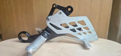 OEM BMW S1000RR (2009-2014) Front Footrest / Rearset Assembly."