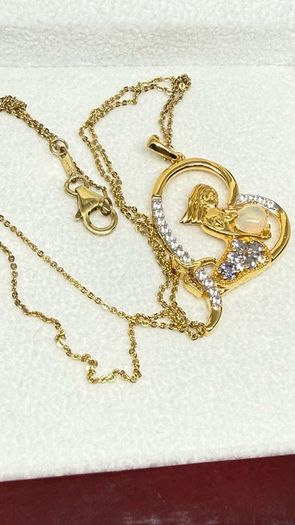 Silver Mermaid in Heart Pendant by Harry Ivens