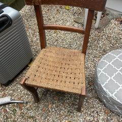 Solid wood chair with woven seat