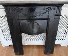 Cast iron fireplace surround