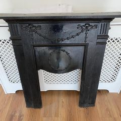 Cast iron fireplace surround