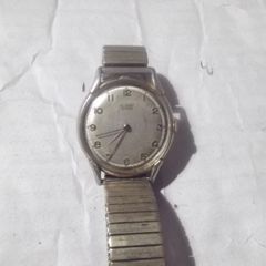 a vintage gents wrist watch by AERO WATCH NEUCHATEL