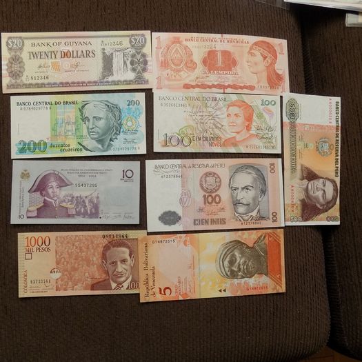 Lot of 9 World Banknotes.Uncirculated.N0.1.