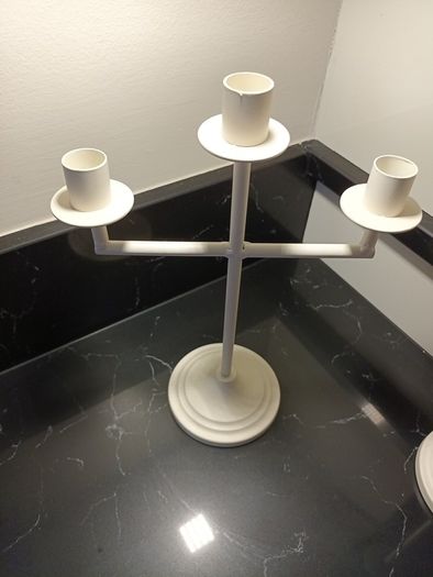 2 matching candle holders