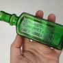 396 - Antique Aceite De Bellotas y Savia De Coco Green Glass Bottle Image 2