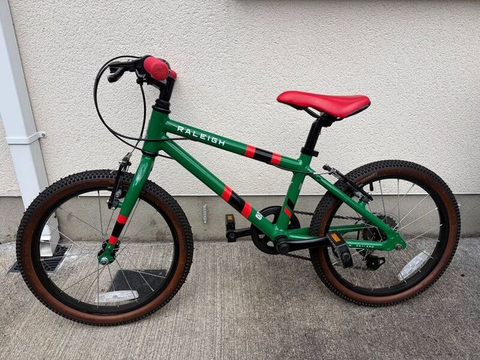 2 Kids Bikes: Raleigh Pop 18 & Carrera Cosmos 14"