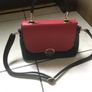 Beautiful handbag with a beautiful colour scheme of black, red and green with adjustable and removable shoulder strap Image 3
