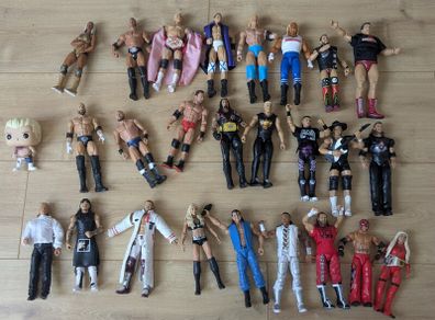24 WWE Figures & 1 Pop! Cody Rhodes