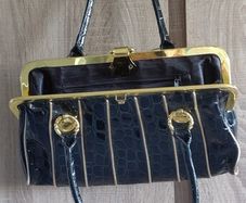 Black lacquered gold bag