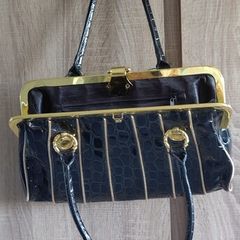 Black lacquered gold bag
