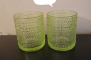 2 green design glasses