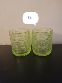 2 green design glasses