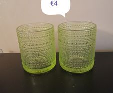 2 green design glasses