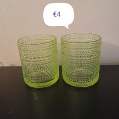 2 green design glasses