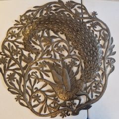 Large cut-metal peacock wall plaque