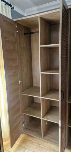 JYSK MANDERUP 3-door wardrobe in a wild oak finish, featuring slatted-style louvered doors.