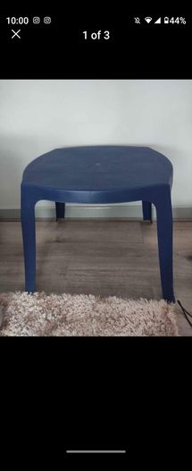 Blue plastic table . please read description