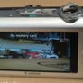 Canon IXUS 1000 HS Digital Camera (High Sensitivity 10 Megapixel, 10x Zoom, 3.0 inch LCD Screen) - Grey Image 10