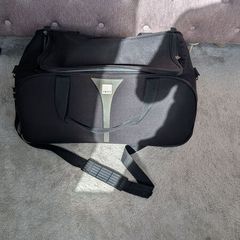Tripp Black Wheeled Travel Duffle Bag / Holdall (55 x 33 x 30 cm)