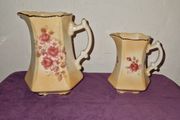Antique pair of Rockingham Staffordshire floral jugs