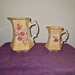 Antique pair of Rockingham Staffordshire floral jugs
