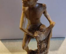 VINTAGE Fisherman with fish / Handmade wooden statue / Indonesian wood