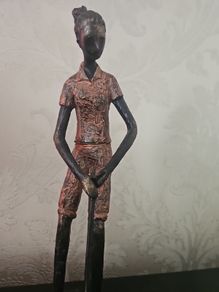 wroth iron woman golfer
