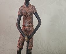 wroth iron woman golfer
