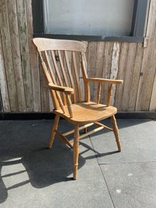 A Late Victorian farmhouse armchair.