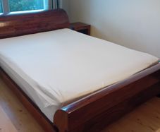 Solid wood king size bed.