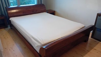 Solid wood king size bed.