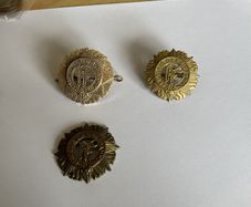Irish Army cap badges three brass one staybrite
