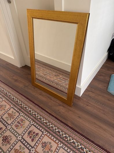 Gold finished wooden mirror