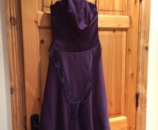 3 deep purple bridesmaids dresses,Alfred Angelo,knee length sizes 8,10,16,also 3matching crovatt and one page boy crovatt ,worn once,can be sold separate