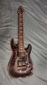 Schecter Omen Extreme-7 String with matching Schaller straplocks