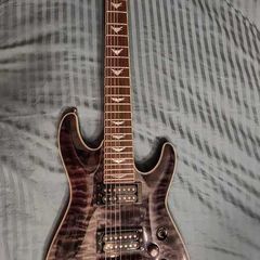 Schecter Omen Extreme-7 String with matching Schaller straplocks