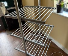 Heated clothes drying rack
