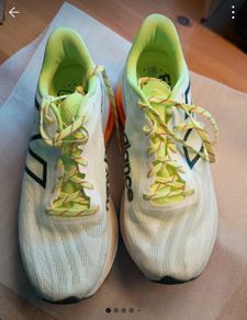 New Balance Fuel Cell Super Comp white, lime, tangerine.